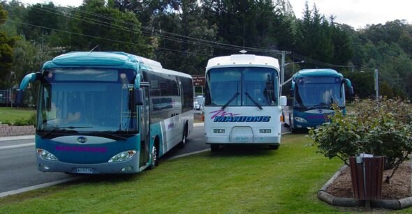 Photo of Manions Buses parked on an angle on the side of the road